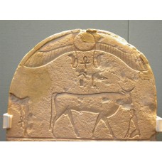 Stone stela with winged solar disc, uraeus, and buchis bull